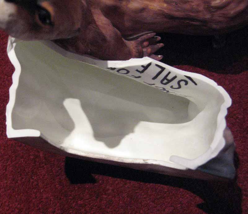 Extensive damage to ceramic base.